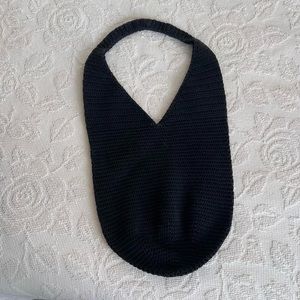 Black crochet bag, made of cotton. Durable.